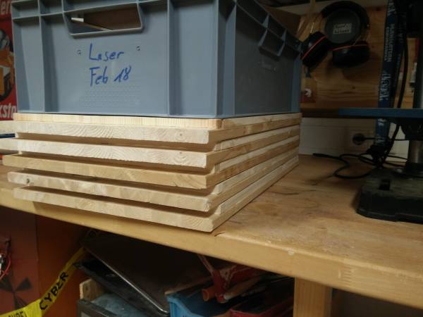 Stack of 5 boards being glued